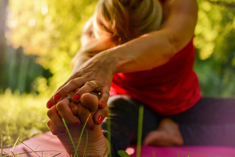 Woman stretching with focus